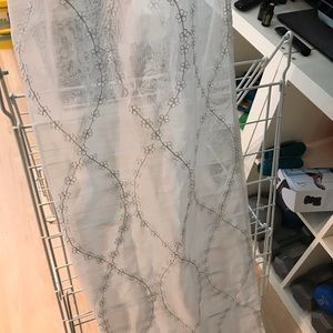 White/silver sheer window panels